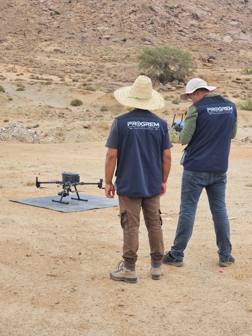 PROGREM team preparing a UAV for a photogrammetric flight